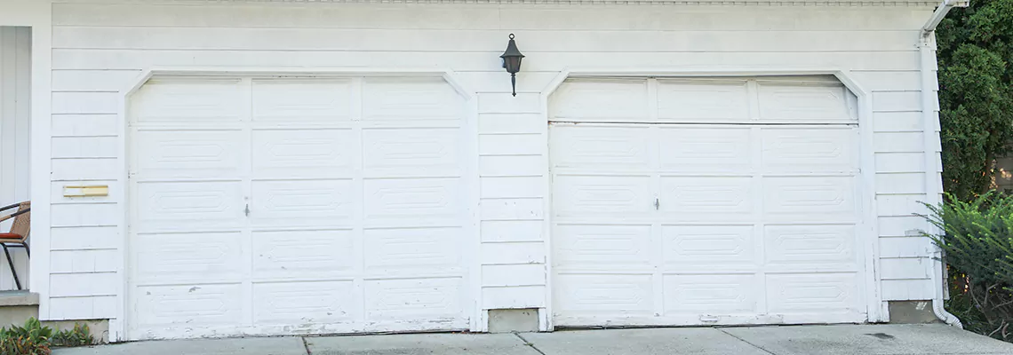 Roller Garage Door Dropped Down Replacement in Tamiami, FL