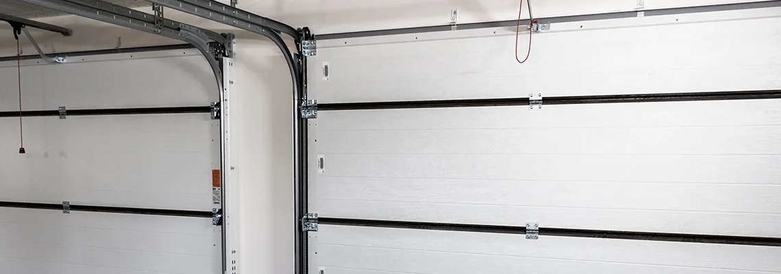 Fix Folding Garage Door Jerking in Tamiami, Florida