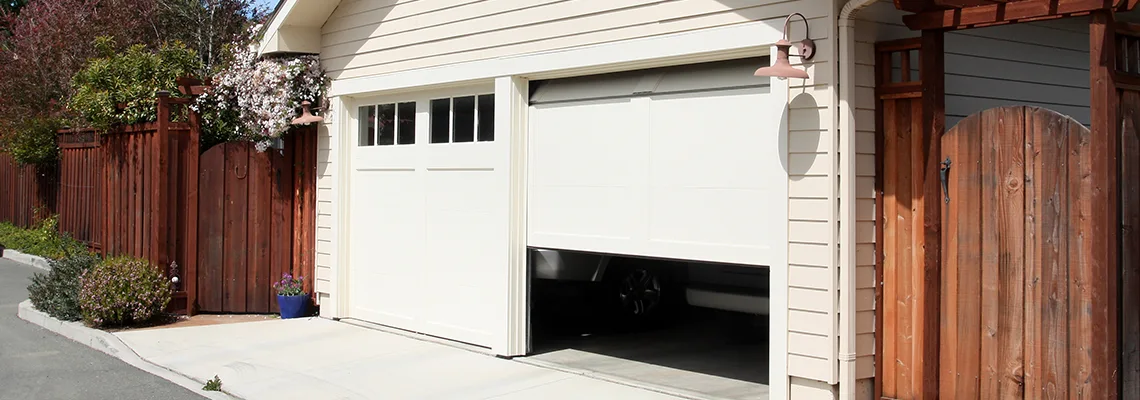 Fix Metal Garage Door Jerking in Tamiami, Florida